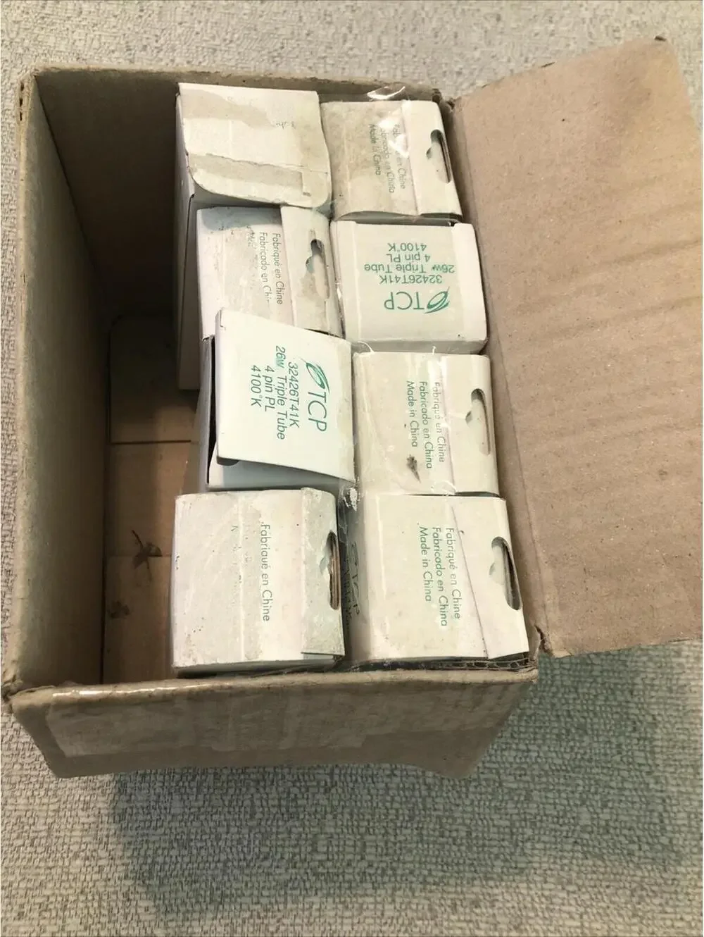TCP 32426T41K 26W Triple Tube 4pin PL 4100 K Light Bulbs. Total Count Of 8